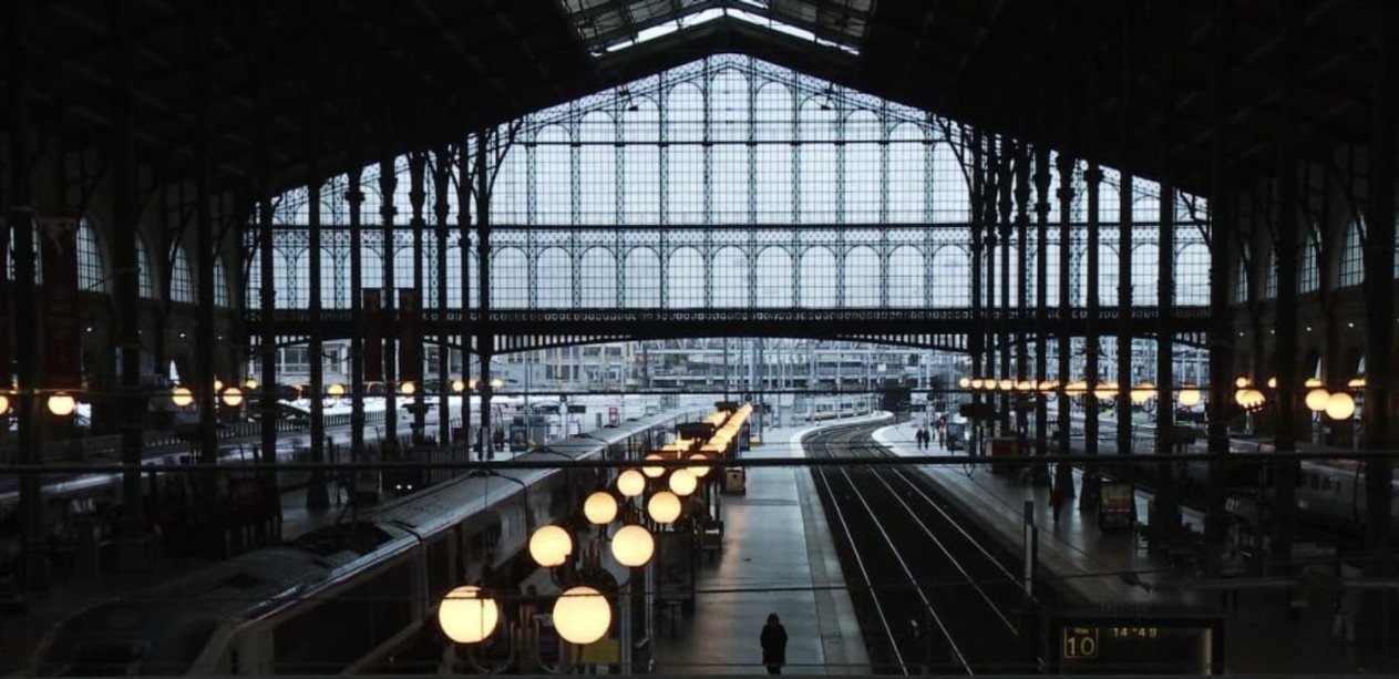 Train hall with glowing lamps