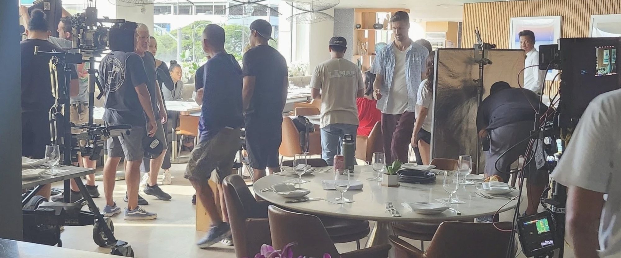 Film crew shooting a restaurant scene